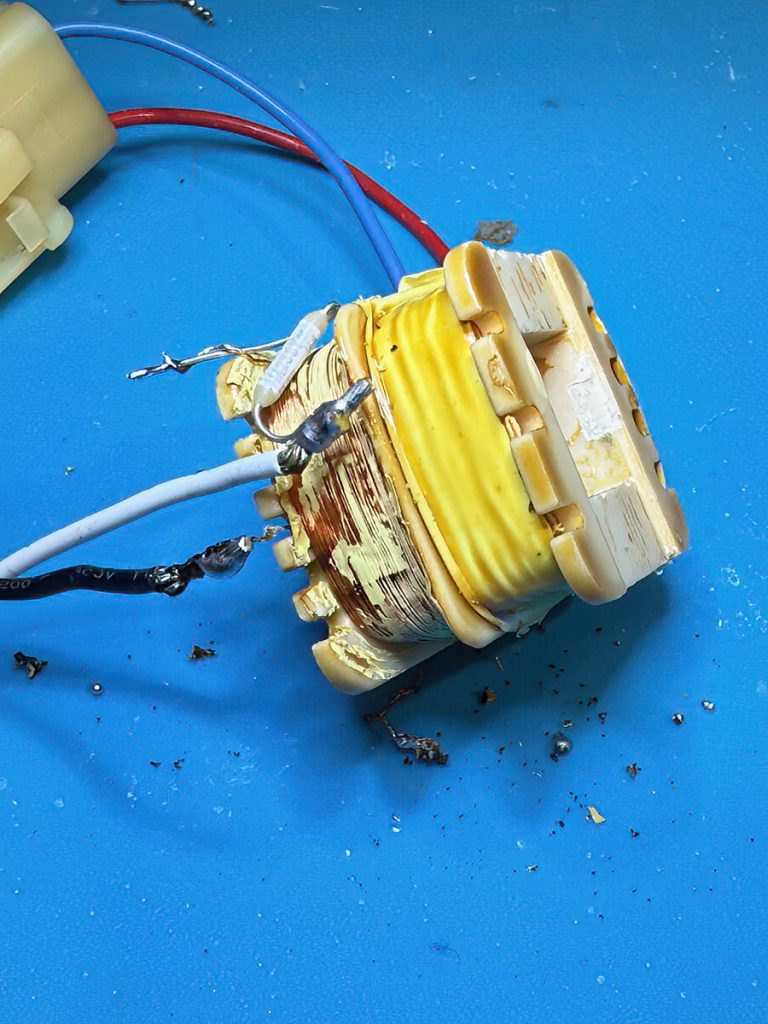 The transformer core windings assembly. The red / blue side or secondary must now be dealt with.