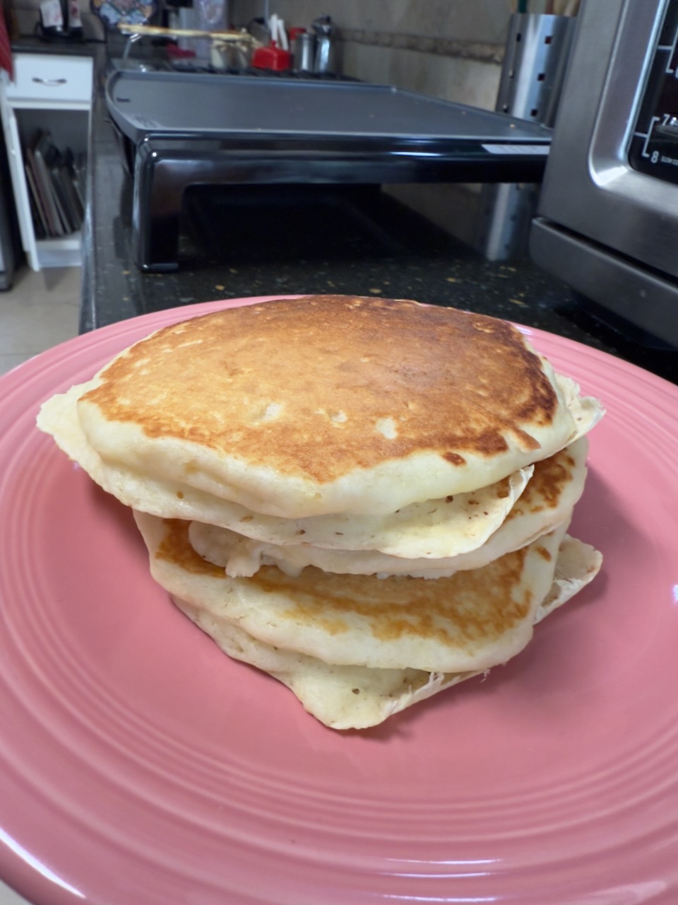 A plate of hot fluffy pancakes